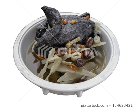 A black chicken soup or silkie chicken soup isolated on White background with clipping path. A black chicken soup or silkie chicken soup isolated on White background with clipping path. 134623421