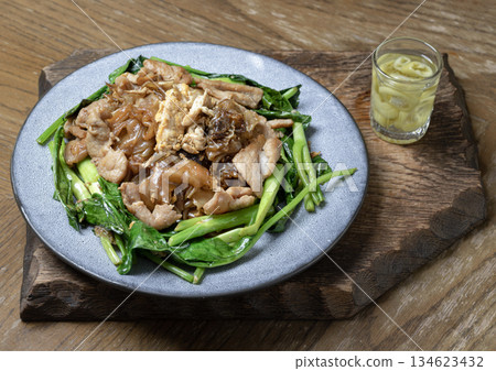 Stir-fried wide rice noodles (Pad See Ew) with soy sauce, pork and Chinese broccoli. 134623432