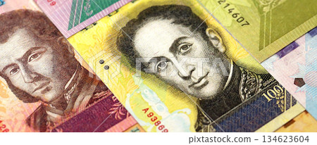 Venezuelan Bolivar currency money bills in big amount. VED currency banknotes with different denomination close up 134623604