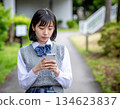 High school girl worried about her smartphone 134623837