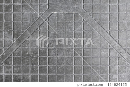 Texture material of a gray metal plate with a regular grid pattern Texture material of a gray metal plate with a regular grid pattern 134624155