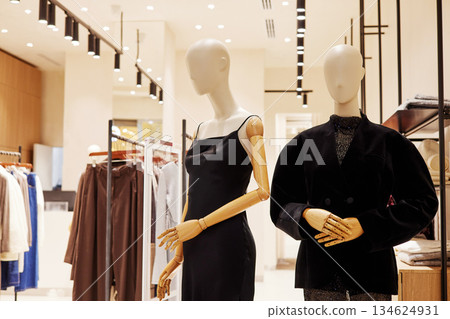 Fashion mannequins displaying modern clothing in boutique store 134624931