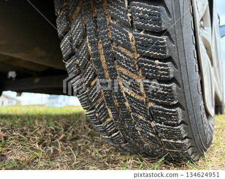 close-up of car tire treads in mud close-up of car tire treads in mud 134624951