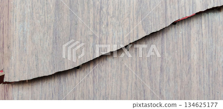 Old, dry, cracked wood texture with wood grain patterns. Old, dry, cracked wood texture with wood grain patterns. 134625177