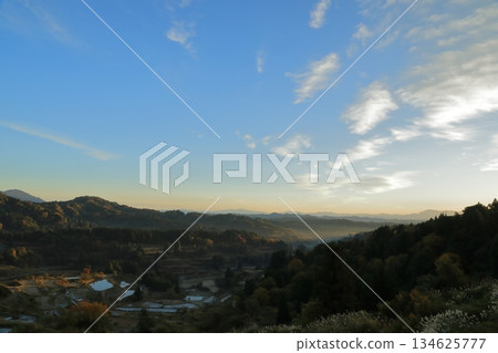 The rice terraces at Tokamachi Hoshitoge reflect the blue sky like a mirror 134625777