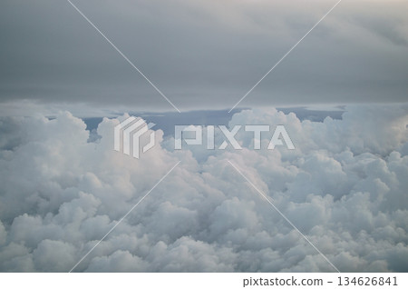 Fluffy White Clouds in Serene Sky Fluffy White Clouds in Serene Sky 134626841