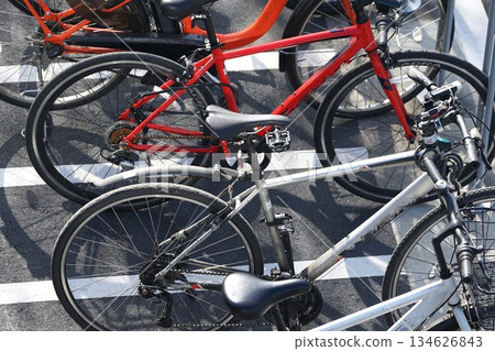 Aerial view of bicycles in a bicycle parking lot Aerial view of bicycles in a bicycle parking lot 134626843