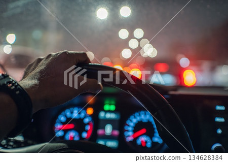 Driving at Night in Traffic 134628384