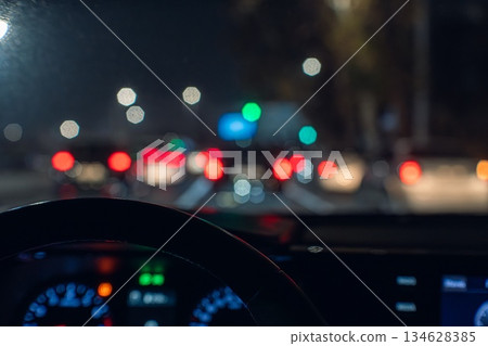 Nighttime Traffic View from Car 134628385