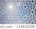 Intricate Geometric Pattern with Sunlight 134628386