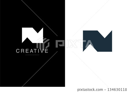 Minimalist Geometric Letter NM Logo. Modern Abstract Arrow Up Mountain Peak Symbol. Clean Technology and Finance Brand Mark Vector. 134630118