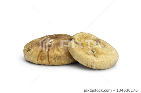 Dried figs stacking together on white background Dried figs stacking together on white background 134630176