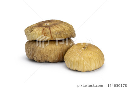 Dried figs stacking together on white background 134630178