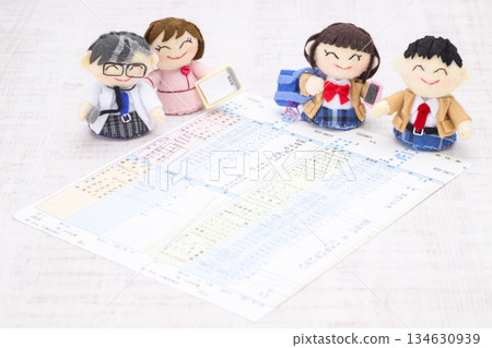 Doctor, nurse, and high school student dolls and medical examination result form 134630939