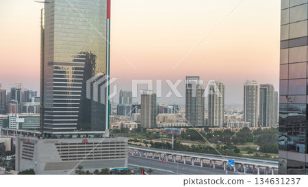 Dubai cityscape showing al barsha area at sunset timelapse in united arab emirates 134631237
