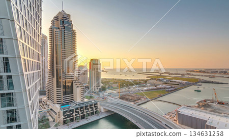 JBR and Dubai marina during sunset aerial timelapse JBR and Dubai marina during sunset aerial timelapse 134631258