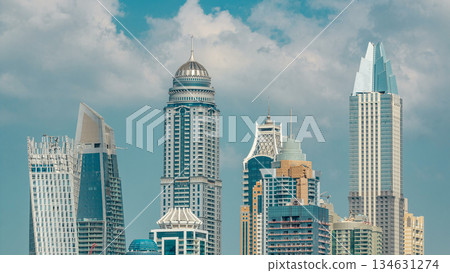 Dubai Marina skyscrapers aerial top view at morning from JLT in Dubai timelapse, UAE. Dubai Marina skyscrapers aerial top view at morning from JLT in Dubai timelapse, UAE. 134631274