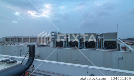 System of industrial central conditioning set on the roof of the building day to night timelapse System of industrial central conditioning set on the roof of the building day to night timelapse 134631309