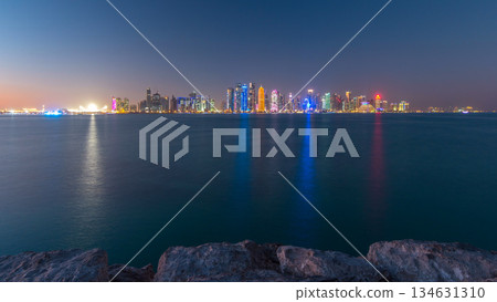 Doha downtown skyline day to night timelapse, Qatar, Middle East 134631310
