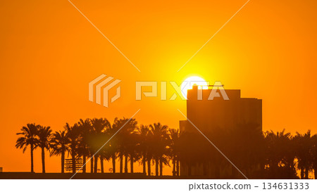 Sunrise from Al Corniche waterfront timelapse in Doha 134631333