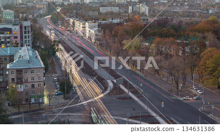 Aerial view with road traffic skyscape day to night timelapse. Kharkiv city from above 134631386