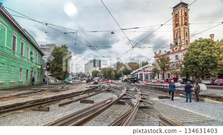 Repair works on the street timelapse. Laying of new tram rails on a city street. Repair works on the street timelapse. Laying of new tram rails on a city street. 134631403