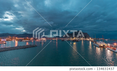 Aerial view of sea with waves and port from ship sailing in the open sea timelapse Aerial view of sea with waves and port from ship sailing in the open sea timelapse 134631437