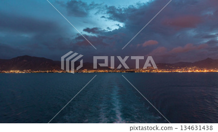 Aerial view of sea with wawes and port from ship sailing in the open sea timelapse Aerial view of sea with wawes and port from ship sailing in the open sea timelapse 134631438