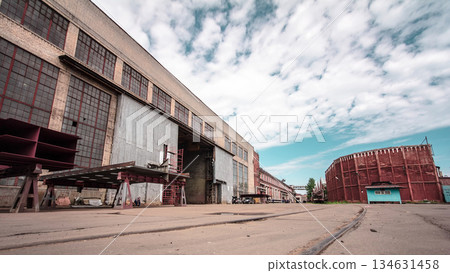 The old factory bricks building with windows and gates timelapse hyperlapse The old factory bricks building with windows and gates timelapse hyperlapse 134631458
