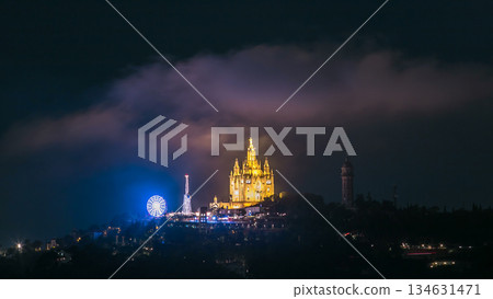 Temple of the Sacred Heart of Jesus timelapse on Tibidabo Mountain in Barcelona in clouds, Catalonia, Spain Temple of the Sacred Heart of Jesus timelapse on Tibidabo Mountain in Barcelona in clouds, Catalonia, Spain 134631471