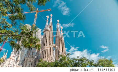 Sagrada Familia, a large Roman Catholic church in Barcelona, Spain timelapse 134631503