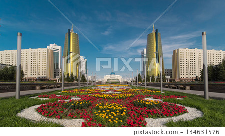 A square in front of Ak Orda with Altyn Orda business center timelapse hyperlapse in the foreground. 134631576