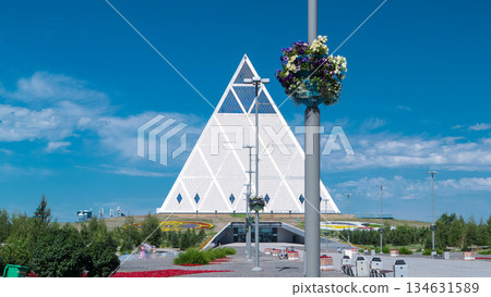 Exterior of the Palace of Peace and Reconciliation building timelapse hyperlapse in Astana, Kazakhstan. 134631589