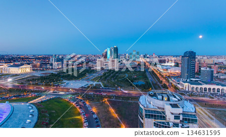 Elevated view over the city center and central business district day to night timelapse, Central Asia, Kazakhstan, Astana Elevated view over the city center and central business district day to night timelapse, Central Asia, Kazakhstan, Astana 134631595