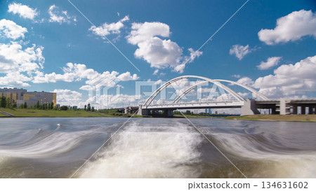 Astana, Kazakhstan. View from Pleasure boat on the river Ishim timelapse hyperlapse drivelapse in Astana. 134631602