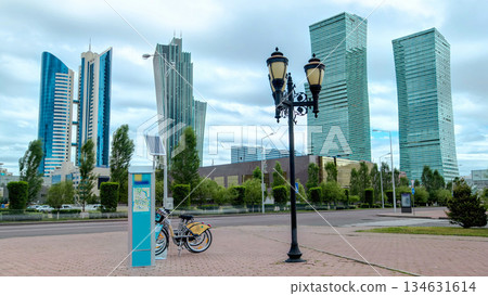 Nurzhol Boulevard timelapse hyperlapse. Modern new office building is in the capital of Republic. Astana, Kazakhstan. 134631614