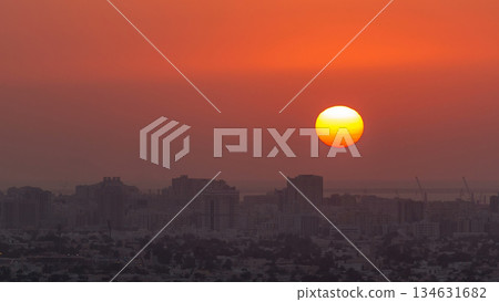 Sunset in Ajman aerial view from rooftop timelapse. United Arab Emirates. Sunset in Ajman aerial view from rooftop timelapse. United Arab Emirates. 134631682