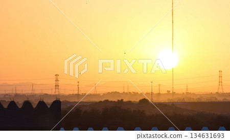 Sunset in Ajman from rooftop timelapse. Ajman is the capital of the emirate of Ajman in the United Arab Emirates. Sunset in Ajman from rooftop timelapse. Ajman is the capital of the emirate of Ajman in the United Arab Emirates. 134631693