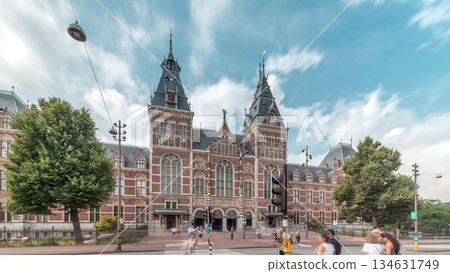 Hyperlapse of the Rijksmuseum, a famous tourist attraction in Museum Square, Amsterdam. Netherlands Hyperlapse of the Rijksmuseum, a famous tourist attraction in Museum Square, Amsterdam. Netherlands 134631749