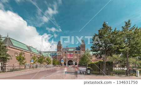 Hyperlapse of the Rijksmuseum, a famous tourist attraction in Museum Square, Amsterdam. Netherlands Hyperlapse of the Rijksmuseum, a famous tourist attraction in Museum Square, Amsterdam. Netherlands 134631750