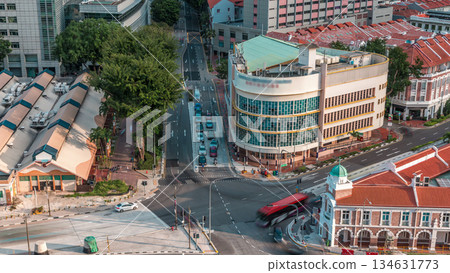 Aerial view of intersection and art deco shophouses along Neil road in Chinatown area timelapse Aerial view of intersection and art deco shophouses along Neil road in Chinatown area timelapse 134631773