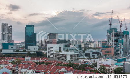 Aerial view of Chinatown with red roofs and Central Business District skyscrapers timelapse, Singapore Aerial view of Chinatown with red roofs and Central Business District skyscrapers timelapse, Singapore 134631775