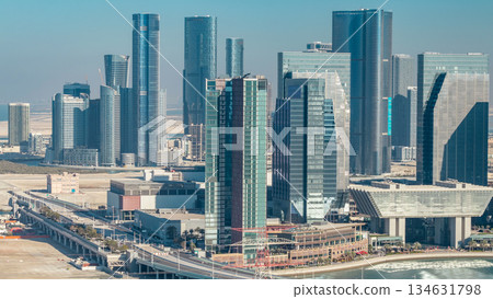 Aerial skyline of Abu Dhabi city centre from above timelapse Aerial skyline of Abu Dhabi city centre from above timelapse 134631798