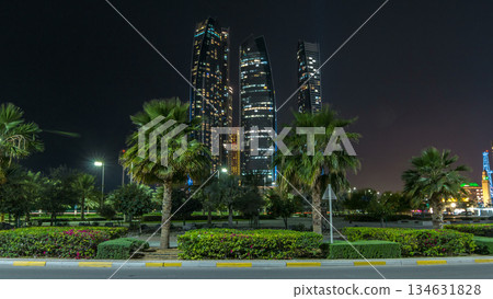 Skyscrapers of Abu Dhabi at night with Etihad Towers buildings timelapse hyperlapse. 134631828