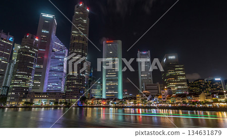 Singapore quay with tall skyscrapers in the central business district on Boat Quay night timelapse hyperlapse Singapore quay with tall skyscrapers in the central business district on Boat Quay night timelapse hyperlapse 134631879