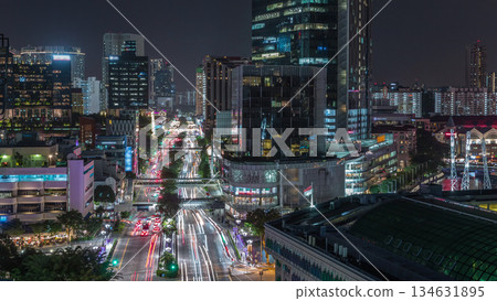 Aerial view of traffic on Eu Tong Sen Street and new bridge road all the way to Chinatown night timelapse Aerial view of traffic on Eu Tong Sen Street and new bridge road all the way to Chinatown night timelapse 134631895