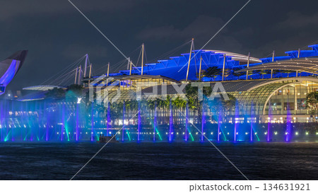 Beautiful laser and musical fountain show at the Marina Bay Sands waterfront in Singapore night timelapse Beautiful laser and musical fountain show at the Marina Bay Sands waterfront in Singapore night timelapse 134631921