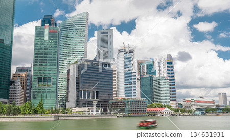 Business Financial Downtown City and Skyscrapers Tower Building at Marina Bay timelapse hyperlapse, Singapore, Business Financial Downtown City and Skyscrapers Tower Building at Marina Bay timelapse hyperlapse, Singapore, 134631931