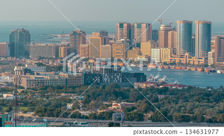 Aerial view of modern city of Dubai with blue sky aerial timelapse 134631977