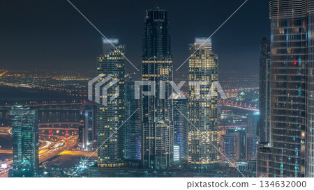 Amazing aerial view of Dubai downtown skyscrapers night timelapse, Dubai, United Arab Emirates Amazing aerial view of Dubai downtown skyscrapers night timelapse, Dubai, United Arab Emirates 134632000